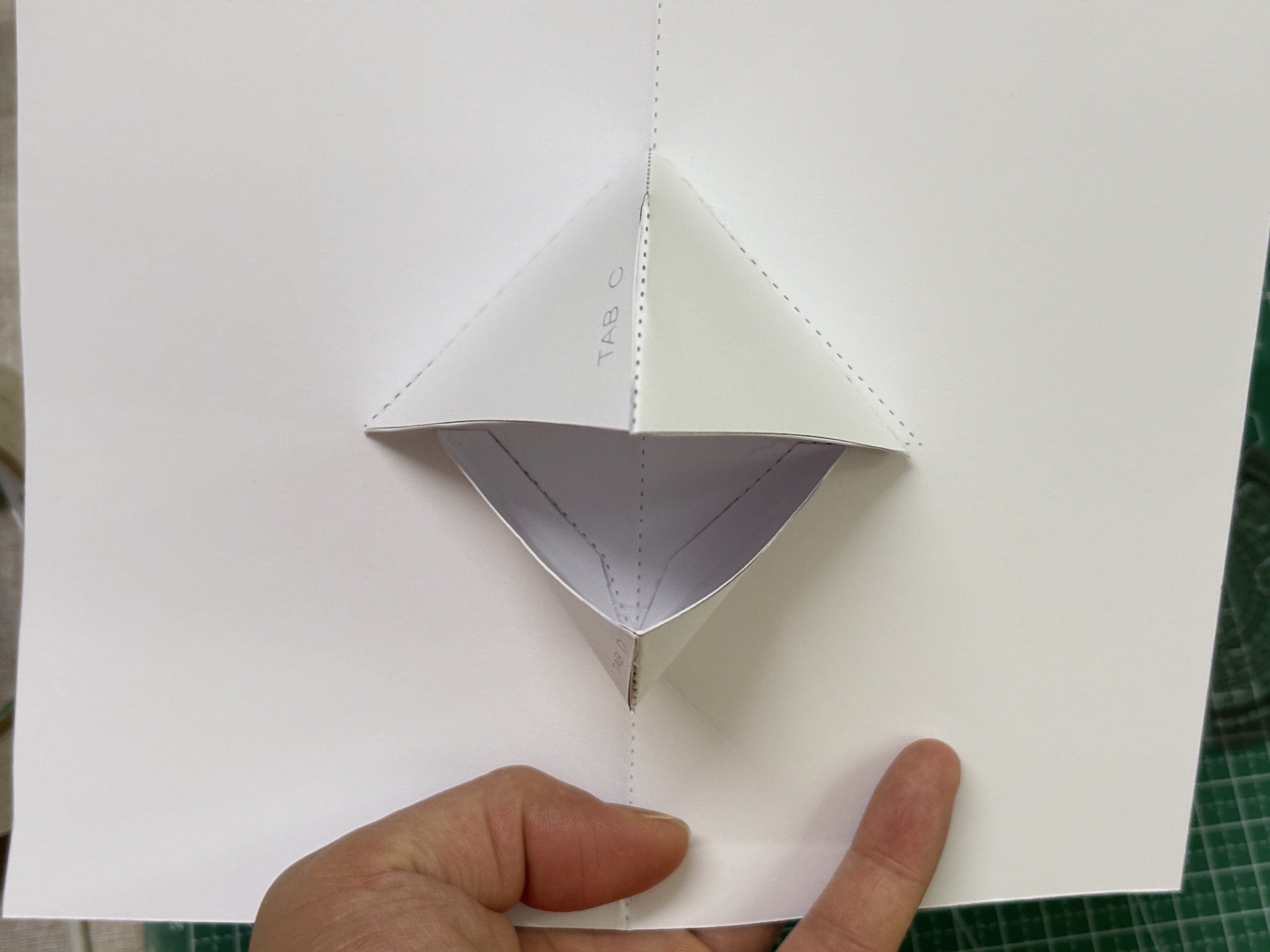 Step 3 folding slowly and checking the opening motion